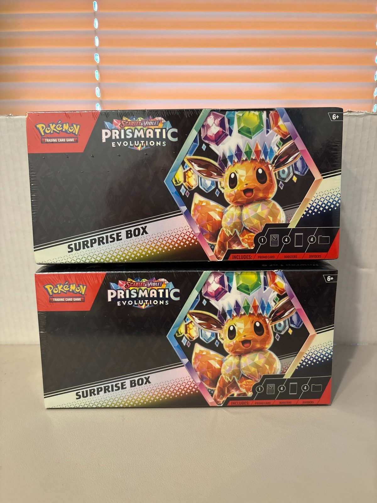 Prismatic evolutions surprise box lot of 2